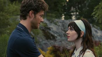 Companion Movie: Standing outdoors, Josh (Jack Quaid, left) faces Iris (Sophie Thatcher), seemingly in deep conversation