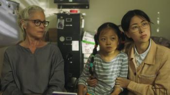 Confetti Movie: Helen, Meimei, and Lan Chen are seated in an office, apparently listening to some serious news