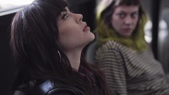 Continue movie: Nadine Crocker stares at the ceiling as Lia Tipton looks at her