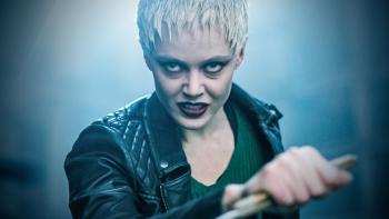 Dampyr: A White woman holds a knife out threateningly
