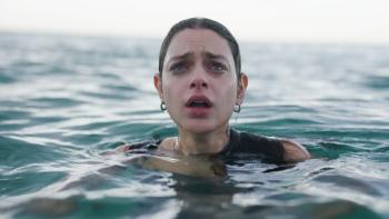 Dangerous Waters Movie: Rose (Odeya Rush) emerges from under water, looking scared and concerned