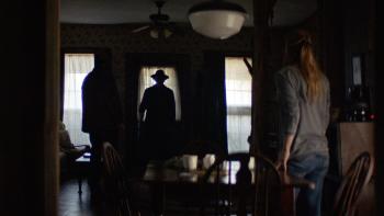 The Dark and the Wicked Movie: A shadowy figure at the door