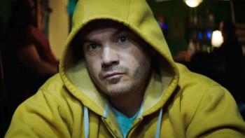 Dead Money movie: Emile Hirsch in yellow hoodie sits at a poker table