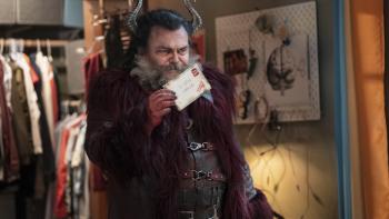 Dear Santa movie: Jack Black is a horned devil in a bedroom holding up a letter addressed "To Satan, North Lope"