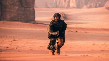 Desert Warrior Movie: The Bandit (Anthony Mackie) runs through the desert, a determined look on his face