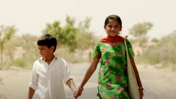 Rainbow: A young Indian brother and sister walk together
