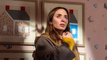 Disclosure Day movie: Emily Blunt looks up at something, shadows crossing her face
