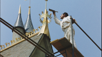 Disneyland Handcrafted: A craftsman puts finishing touches on the castle.