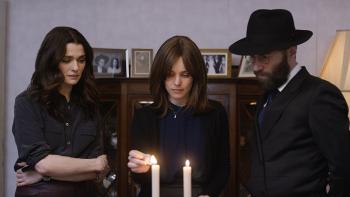 Disobedience Movie: Ronit, Esti, and Dovid lighting ceremonial candles 