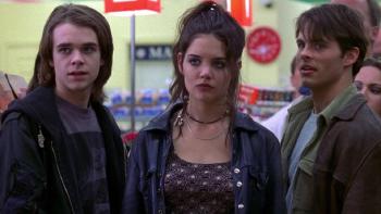 Disturbing Behavior: Two teen boys and a teen girl stand in a high-school cafeteria