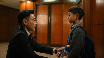 Double Happiness movie: Kuan-ting Liu squats at eye level will his child self