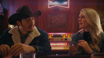 Downtown Owl: Main character Julia and love interest Vance seated side by side at a bar.