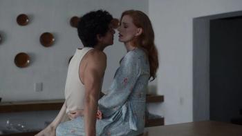 Dreams movie: Isaac Hernandez and Jessica Chastain stand intimately close to each other in a modern, minimalistic room