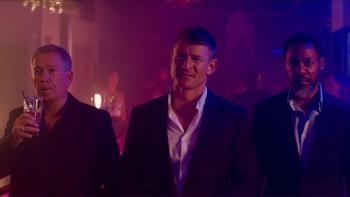 Duchess: Colm Meaney, Philip Winchester, and Hoji Fortuna stand in a dimly lit club holding drinks