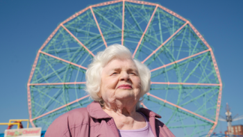 Eleanor the Great movie: June Squibb stands in front of a ferris wheel