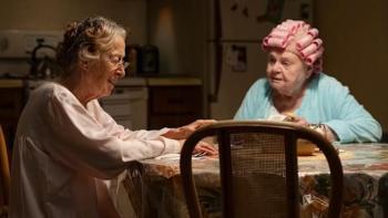 Eleanor the Great movie: Rita Zohar and June Squibb talk while sitting at a breakfast table in their robes and rollers