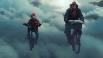 Elf Me: Trip and Elia ride bikes. 