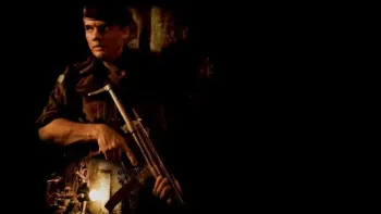 Elite Squad: Armed soldier in military uniform holding rifle in dark setting