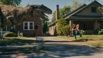 The End of Oak Street Movie: Brian and Audrey race down the street, pursued by a huge, angry T-Rex