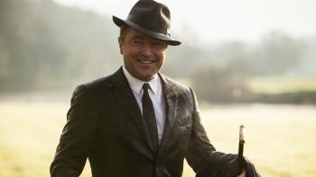 Blackbird: Michael Flatley smiling in a suit and hat