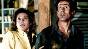 Evil Dead II Movie: In the cabin, Annie and Ash look up in shock at something