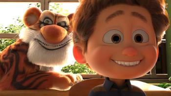 Extinction: Animals Unite! movie: Mohsen smiles in class as Tigy sits on a wall behind him