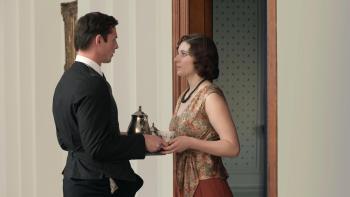 Fackham Hall: Ben Radcliffe hands Thomasin McKenzie a tray of tea as the two gaze into each other's eyes