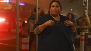 Faith in the Flames: The Nichole Jolly Story movie: Chrissy Metz stands in scrubs, adjusts a stethoscope around her neck