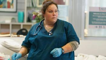 Faith in the Flames: The Nichole Jolly Story movie: Chrissy Metz stands in a hospital in scrubs and gloves