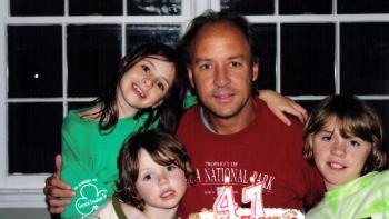 A Father's Promise Movie: A old family photo taken at a birthday party