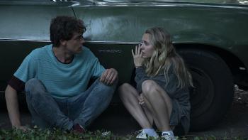 Fear of Rain Movie: Caleb and Rain hide behind a car