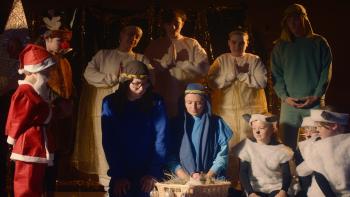Feather Christmas: Adults and children are dressed up in a Nativity scene