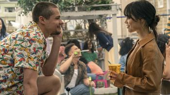 Finestkind Movie: Toby Wallace smiles goofily at Jenna Ortega at an outdoor barbecue