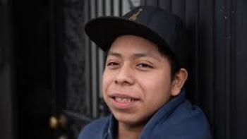 Five Years North Movie: Guatemalan boy wearing baseball hat