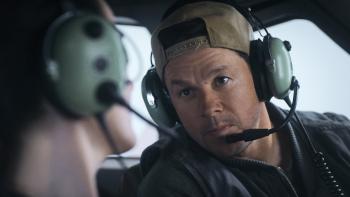 Flight Risk movie: Mark Wahlberg talks to Michelle Dockery through aviation headphones on a plane