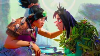 Forgotten Island movie: Jo and Raissa share an emotional moment, staring into each other's eyes in a colorful, lush setting