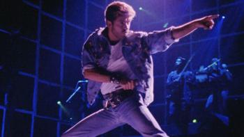 Freedom Uncut: George Michael is seen performing on-stage in jeans and a denim jacket and a white t-shirt
