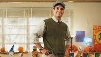 Front of the Class: James Wolk in classroom