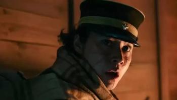 Golden Kamuy: Soldier in uniform and hat, looking surprised in dim lighting.