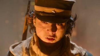 Golden Kamuy: Young soldier with a stern expression, wearing a cap and scarf.