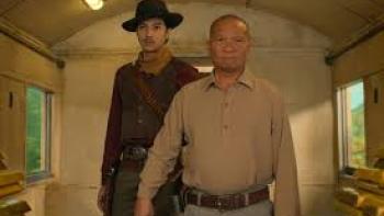 Gold Rush Gang: 2 Asian men, one with cowboy hat