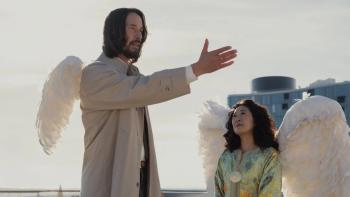 Good Fortune movie: Keanu Reeves and Sandra Oh wear large white wings while standing outdoors