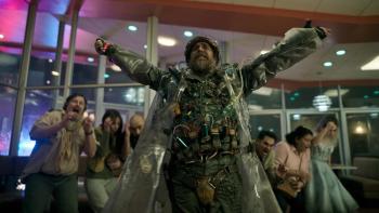 Good Luck, Have, Fun, Don't Die movie: Sam Rockwell holds what he says is a bomb in front of a diner full of scared hostages