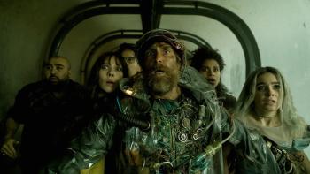 Good Luck, Have, Fun, Don't Die movie: Sam Rockwell looks frightened while holding back a group of people