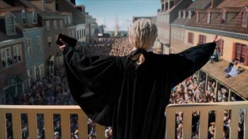 A Great Awakening Movie: Seen from behind, George Whitefield preaches to thousands, his arms spread wide