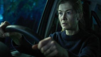 Hallow Road: Tears roll down Rosamund Pike's cheeks as she drives a car in the dark