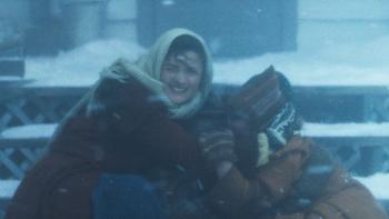 Hazel's Heart movie:  Madelyn Dundon huddles on the school steps holding Xavier and Genevieve Bielinski