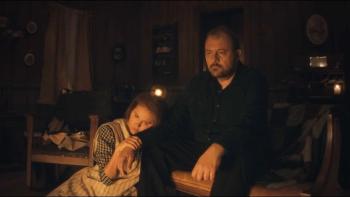 Hazel's Heart movie: William and Blanche hold each other in front of their fireplace