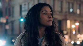 He Calls Me Daughter movie: A young woman looks forlorn while walking in a city