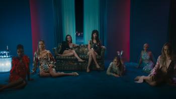 Her Private Hell Movie: Seven women, posed seated around a small couch, appear to be listening to a story